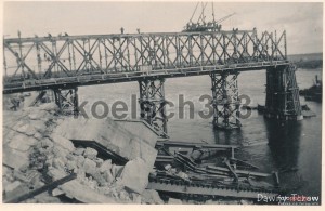 1939-1940_Prace_przy_odbudowie_mostu_kolejowego_928264_Fotopolska-Eu.jpg